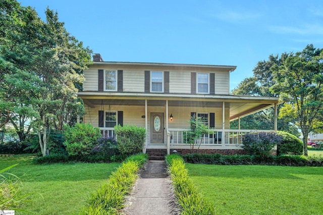 203 Camellia Ln, Simpsonville, SC 29681 - view of front of home with a front lawn, a porch, and a chimney