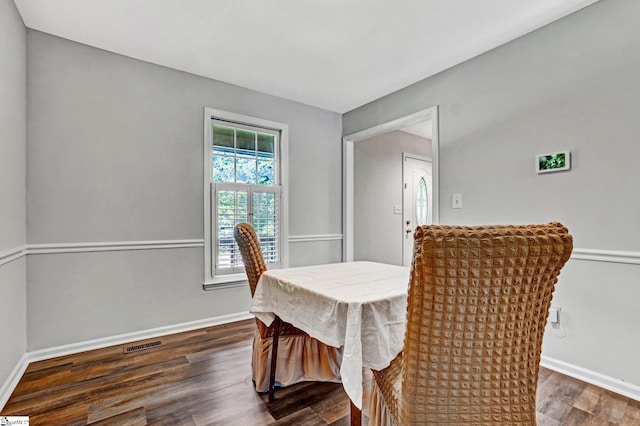 203 Camellia Ln, Simpsonville, SC 29681 - dining space featuring dark wood-style floors and baseboards