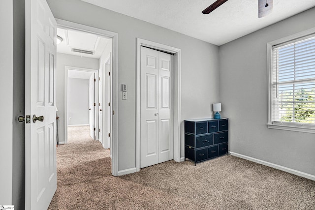 203 Camellia Ln, Simpsonville, SC 29681 - bedroom with attic access, light colored carpet, a closet, and a ceiling fan