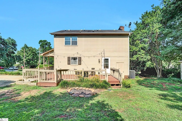 203 Camellia Ln, Simpsonville, SC 29681 - back of house featuring a lawn, a chimney, and a wooden deck