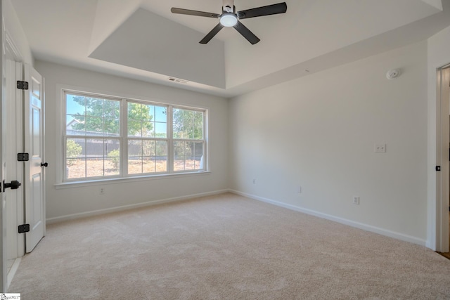 101 Clearbrook Ct, Greer, SC 29650 - empty room featuring light colored carpet, a raised ceiling, ceiling fan, and a smoke detector