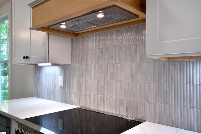 72 Seminole Dr, Simpsonville, SC 29680 - kitchen with range hood, tasteful backsplash, and black electric cooktop