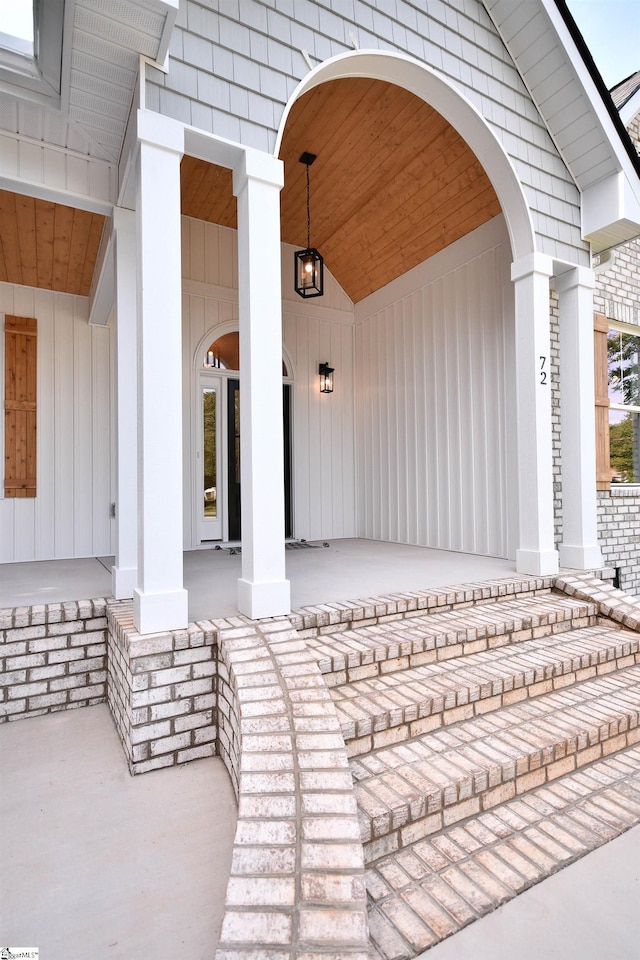 72 Seminole Dr, Simpsonville, SC 29680 - entrance to property featuring covered porch and board and batten siding