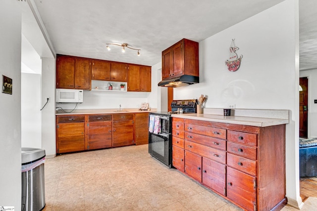 302 Douglas St, Laurens, SC 29360 - kitchen featuring black electric range, white microwave, under cabinet range hood, open shelves, and light countertops