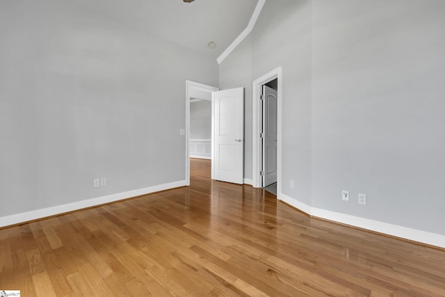 528 Carolee Way, Greer, SC 29651 - spare room with high vaulted ceiling and wood finished floors