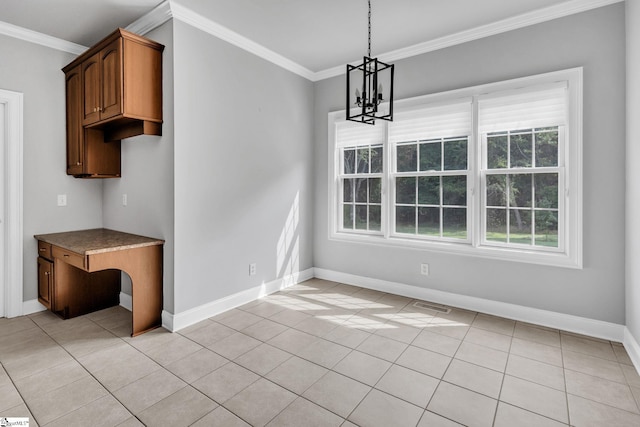 528 Carolee Way, Greer, SC 29651 - unfurnished dining area featuring a chandelier, ornamental molding, plenty of natural light, and light tile patterned flooring