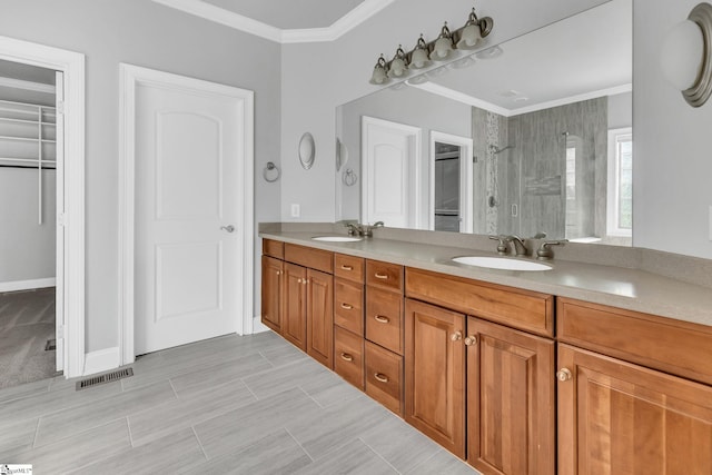 528 Carolee Way, Greer, SC 29651 - full bathroom featuring ornamental molding, a walk in closet, double vanity, and tiled shower