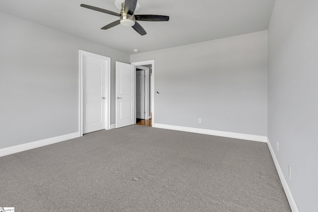 528 Carolee Way, Greer, SC 29651 - unfurnished bedroom featuring carpet and a ceiling fan