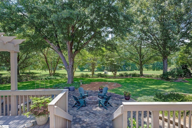 163 Tupelo Dr, Greer, SC 29651 - view of grassy yard with a fire pit and view of scattered trees