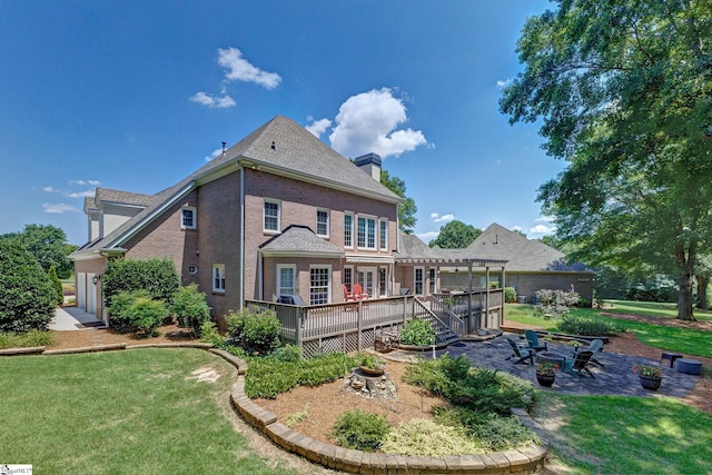 163 Tupelo Dr, Greer, SC 29651 - back of house with a deck, a patio area, a pergola, a yard, and brick siding