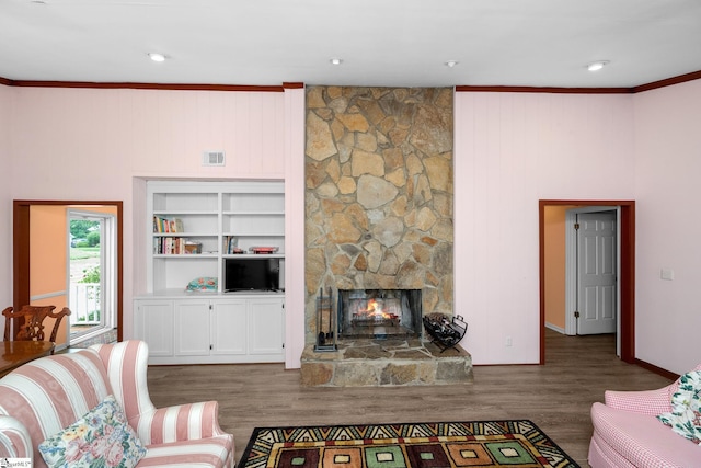 908 Harness Trl, Greenville, SC 29681 - living area featuring ornamental molding, a fireplace, wood finished floors, and wood walls