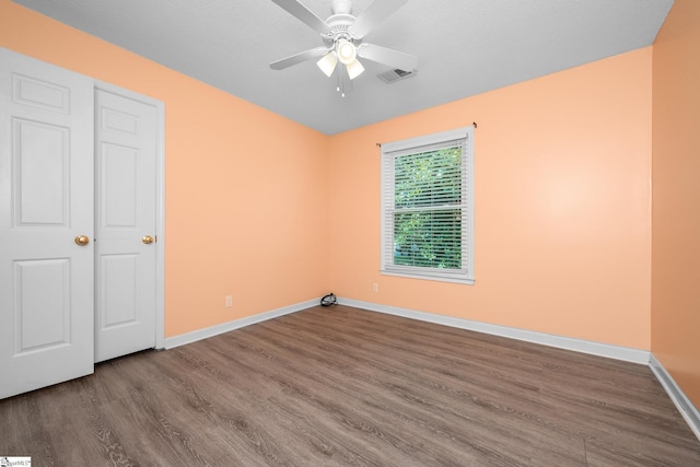 908 Harness Trl, Greenville, SC 29681 - unfurnished bedroom with wood finished floors and a ceiling fan