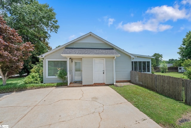 908 Harness Trl, Greenville, SC 29681 - rear view of house featuring a shingled roof and concrete driveway
