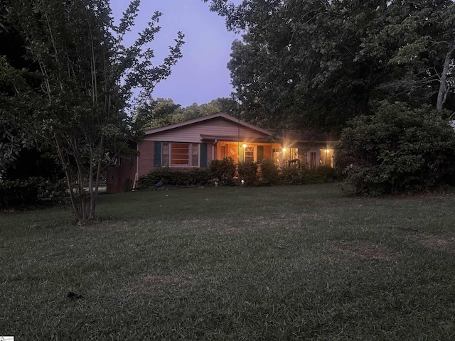 228 Styles Rd, Taylors, SC 29687 - view of front of house with a lawn