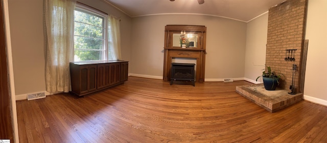 228 Styles Rd, Taylors, SC 29687 - living room featuring a fireplace, wood finished floors, crown molding, and a ceiling fan