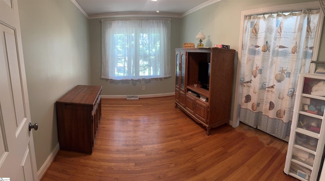228 Styles Rd, Taylors, SC 29687 - bedroom with light wood finished floors and crown molding