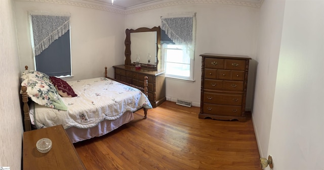 228 Styles Rd, Taylors, SC 29687 - bedroom with wood finished floors and ornamental molding