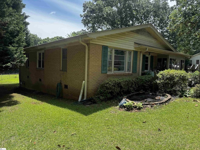 228 Styles Rd, Taylors, SC 29687 - view of side of home featuring a lawn, crawl space, and brick siding