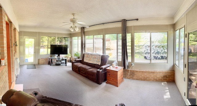 228 Styles Rd, Taylors, SC 29687 - sunroom / solarium with ceiling fan, brick wall, carpet floors, and a textured ceiling