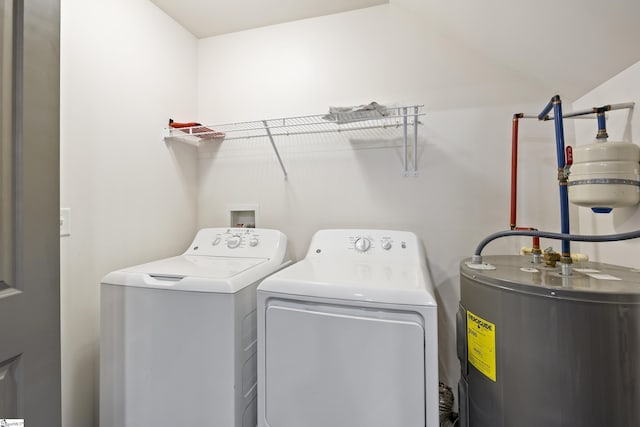 235B Pendleton Rd, Clemson, SC 29631 - laundry area featuring electric water heater and washing machine and clothes dryer