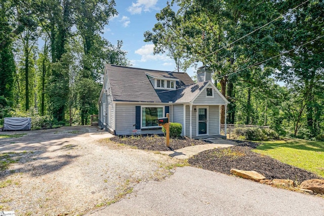 2 Line St, Taylors, SC 29687 - view of front facade featuring a chimney and roof with shingles