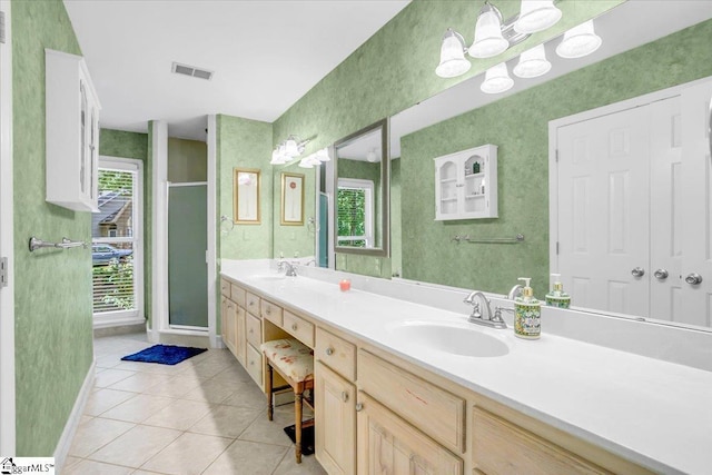 100 Whittlin Way, Taylors, SC 29687 - bathroom with tile patterned flooring, plenty of natural light, double vanity, a stall shower, and wallpapered walls