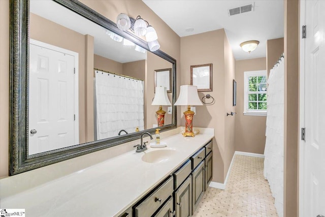 100 Whittlin Way, Taylors, SC 29687 - bathroom featuring baseboards and vanity