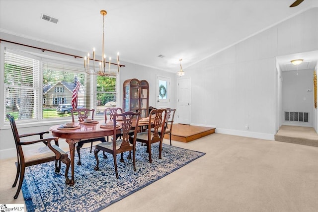 100 Whittlin Way, Taylors, SC 29687 - dining space with lofted ceiling, light carpet, attic access, crown molding, and a chandelier