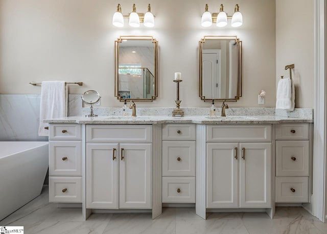 2765 Brockman Mcclimon Rd, Greer, SC 29651 - full bath with marble finish flooring, double vanity, a freestanding tub, and a shower with door