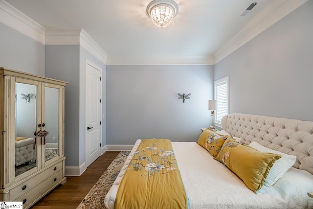 2765 Brockman Mcclimon Rd, Greer, SC 29651 - bedroom featuring ornamental molding, dark wood-type flooring, and a chandelier