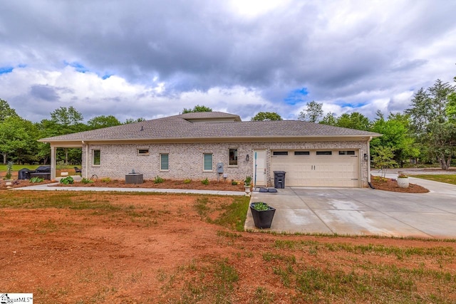 2765 Brockman Mcclimon Rd, Greer, SC 29651 - view of front of property with concrete driveway, a garage, and brick siding