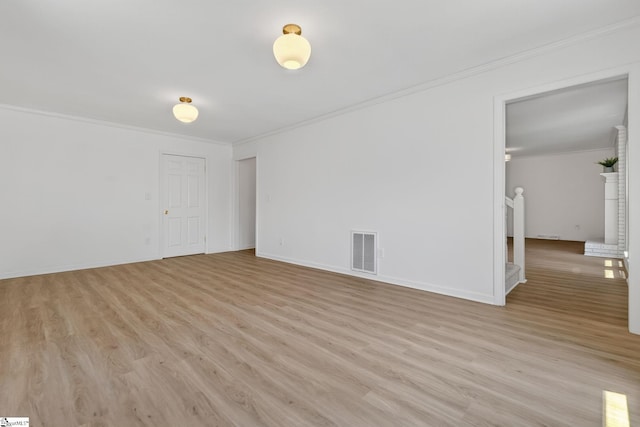 103 Gaithburg Sq, Taylors, SC 29687 - spare room with crown molding, light wood finished floors, and stairs