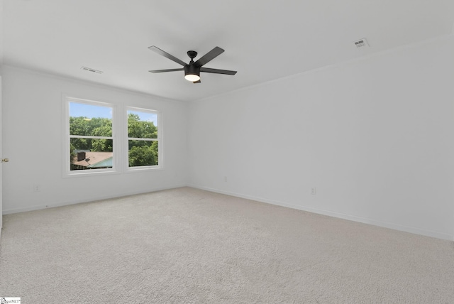 103 Gaithburg Sq, Taylors, SC 29687 - spare room with crown molding, ceiling fan, and light colored carpet