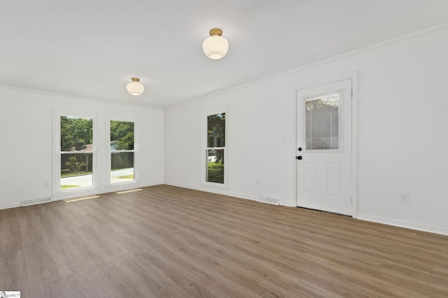 103 Gaithburg Sq, Taylors, SC 29687 - unfurnished living room with ornamental molding and light wood finished floors