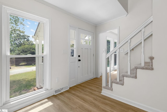 103 Gaithburg Sq, Taylors, SC 29687 - entrance foyer with ornamental molding, wood finished floors, and stairs