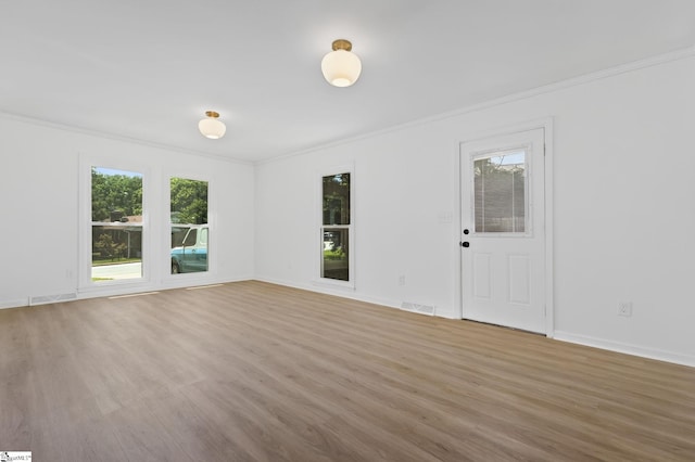 103 Gaithburg Sq, Taylors, SC 29687 - unfurnished living room featuring ornamental molding and wood finished floors