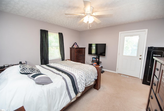 262 Bagwell Dr, Pauline, SC 29374 - bedroom featuring a textured ceiling, light colored carpet, and ceiling fan