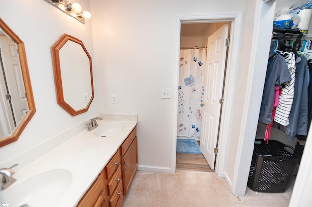 262 Bagwell Dr, Pauline, SC 29374 - full bath with double vanity, a shower with shower curtain, and a walk in closet
