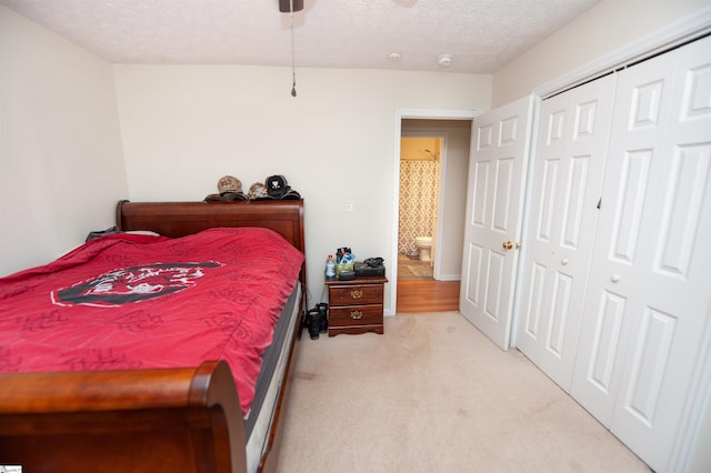 262 Bagwell Dr, Pauline, SC 29374 - bedroom featuring light colored carpet, a textured ceiling, a closet, and ceiling fan