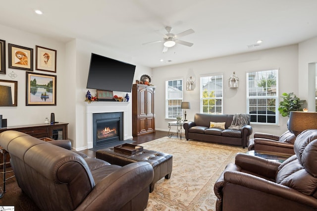 506 Bellot Winds Dr, Duncan, SC 29334 - living area with ceiling fan, a fireplace with flush hearth, recessed lighting, and dark wood-type flooring
