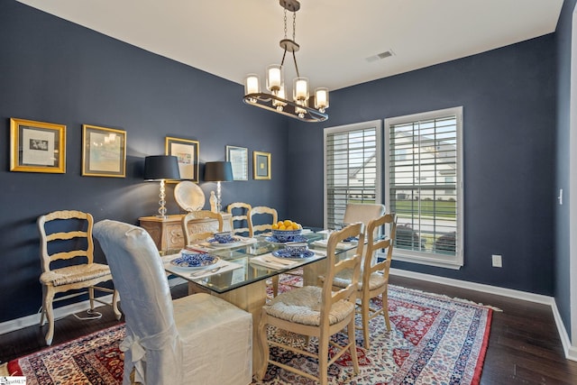 506 Bellot Winds Dr, Duncan, SC 29334 - dining area with healthy amount of natural light, a chandelier, and wood finished floors