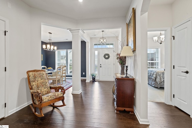 506 Bellot Winds Dr, Duncan, SC 29334 - entryway with a chandelier, decorative columns, and dark wood finished floors