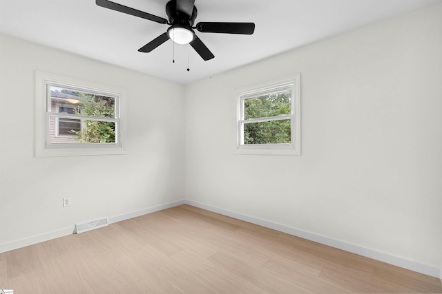 2318 S Mcduffie St, Anderson, SC 29624 - unfurnished room featuring light wood-type flooring and a ceiling fan