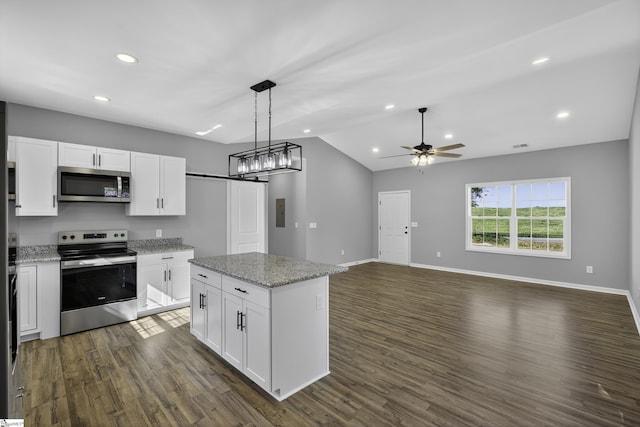 107 Toney Creek Rd, Belton, SC 29627 - kitchen featuring stainless steel appliances, vaulted ceiling, white cabinets, ceiling fan, and dark wood-type flooring