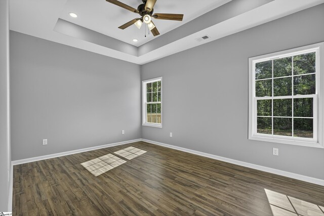 107 Toney Creek Rd, Belton, SC 29627 - unfurnished room with healthy amount of natural light, a ceiling fan, wood finished floors, a tray ceiling, and recessed lighting