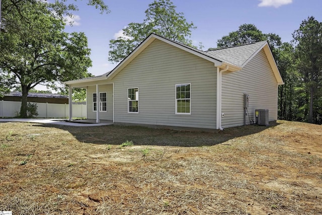 107 Toney Creek Rd, Belton, SC 29627 - rear view of house featuring a patio area and roof with shingles
