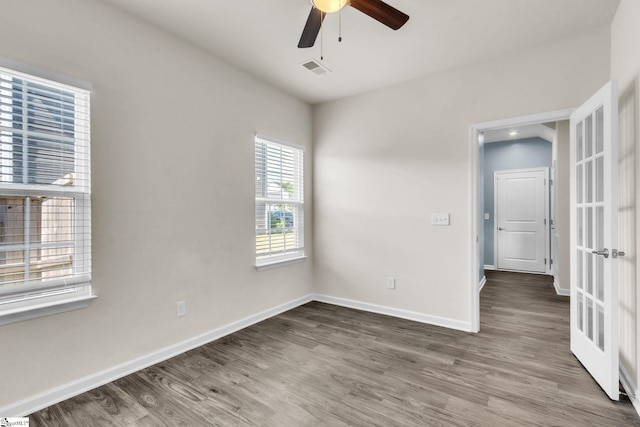 10 Wiltshire Cir, Easley, SC 29642 - spare room featuring wood finished floors, a ceiling fan, and french doors