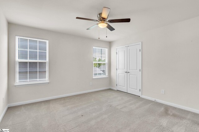 10 Wiltshire Cir, Easley, SC 29642 - unfurnished bedroom with carpet flooring, a closet, and a ceiling fan