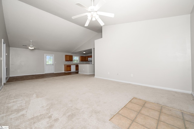 196 Reedy Fork Rd, Greenville, SC 29605 - unfurnished living room with a ceiling fan, light colored carpet, and vaulted ceiling