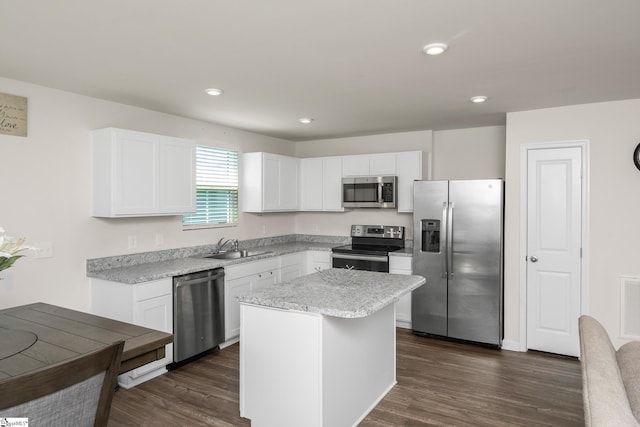 140 Barrington Creek Rd, Piedmont, SC 29673 - kitchen featuring stainless steel appliances, dark wood-style flooring, white cabinets, a kitchen island, and recessed lighting